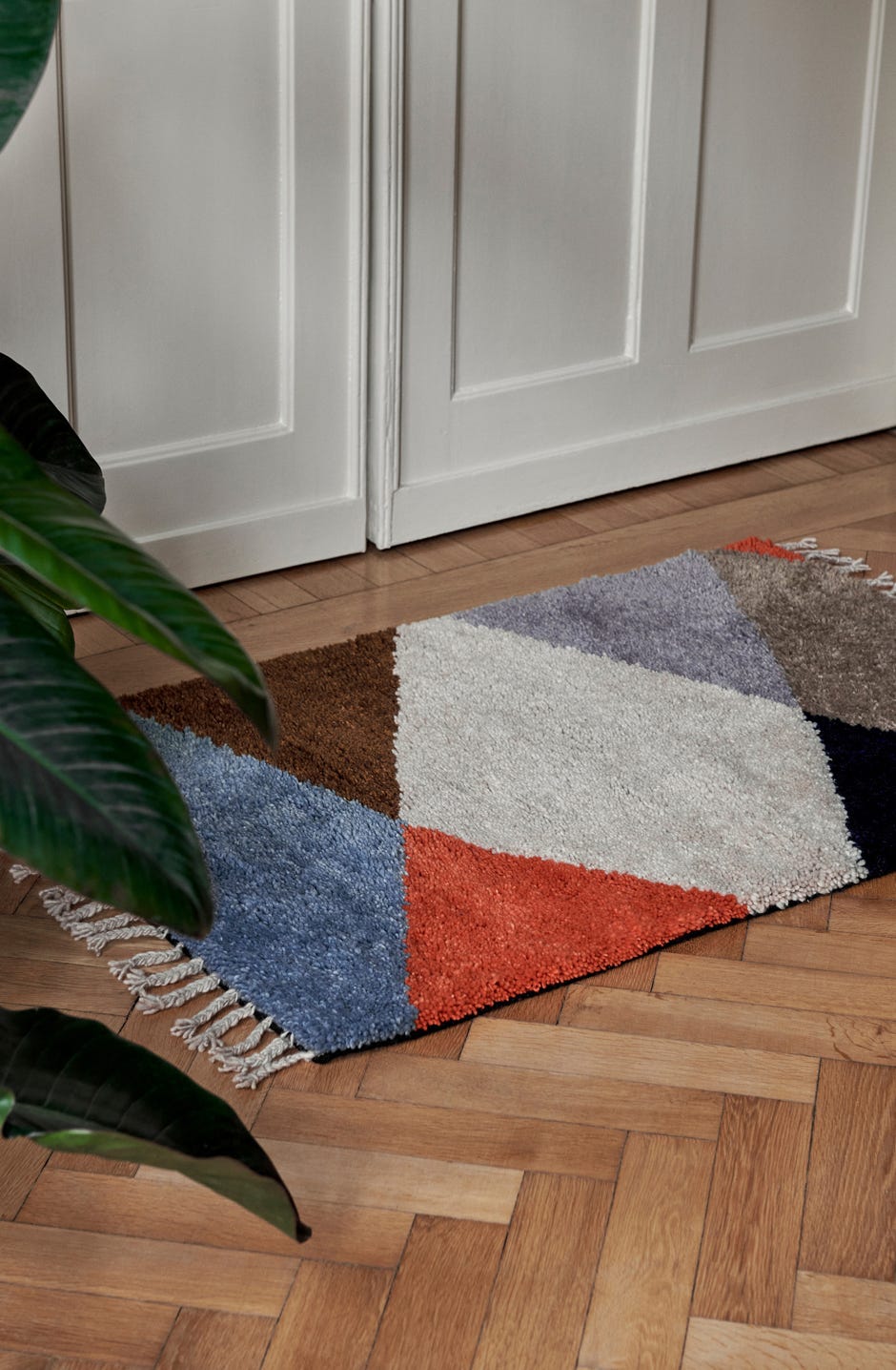 Harlequin rug & cushion 